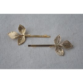 Horquillas de hojas oro.
